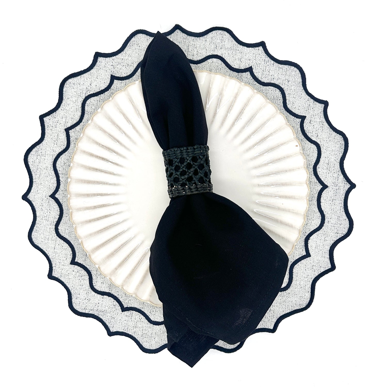 Individual antimanchas redondo bordado ondas gris y marino