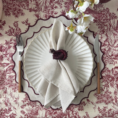 Individual antimanchas redondo bordado ondas beige y burdeos