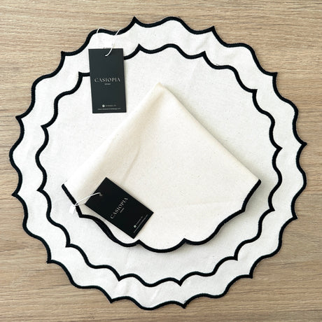 Servilleta algodón hueso bordado ondas negro