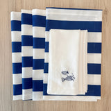 Set 4 Individuales antimanchas Rayas marino + 4 Servilletas bordadas Peces