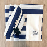 Set 4 Individuales antimanchas Rayas marino + 4 Servilletas bordadas peces + Panera