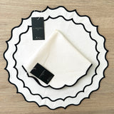 Individual antimanchas redondo hueso bordado negro